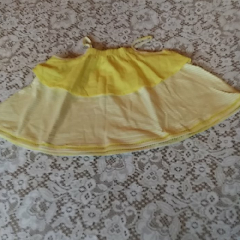 I'm selling a yellow baby shirt